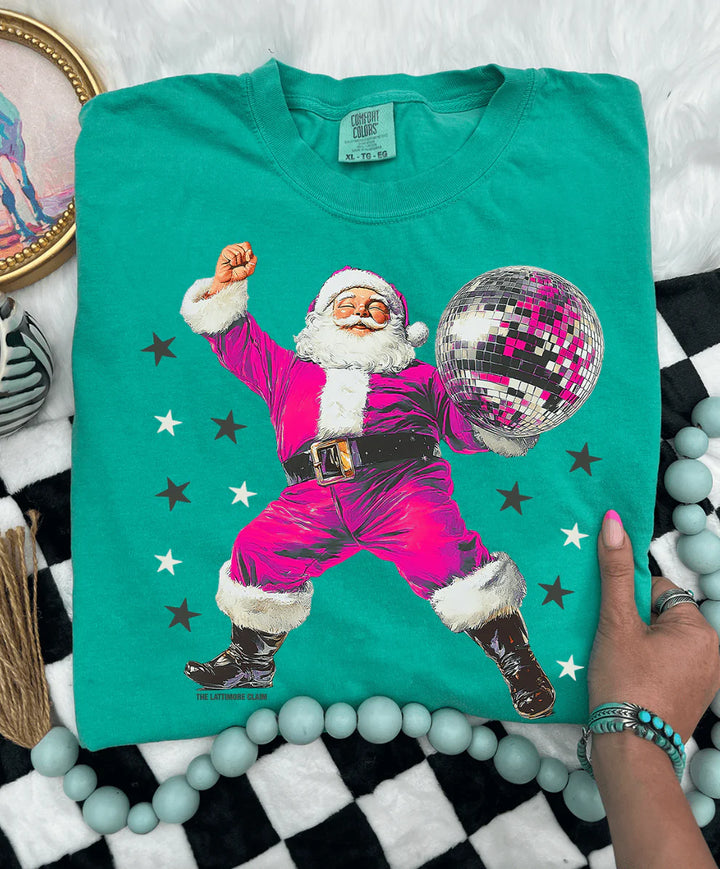Teal t-shirt with a colorful Santa Claus design holding a disco ball, displayed on a checkered surface.