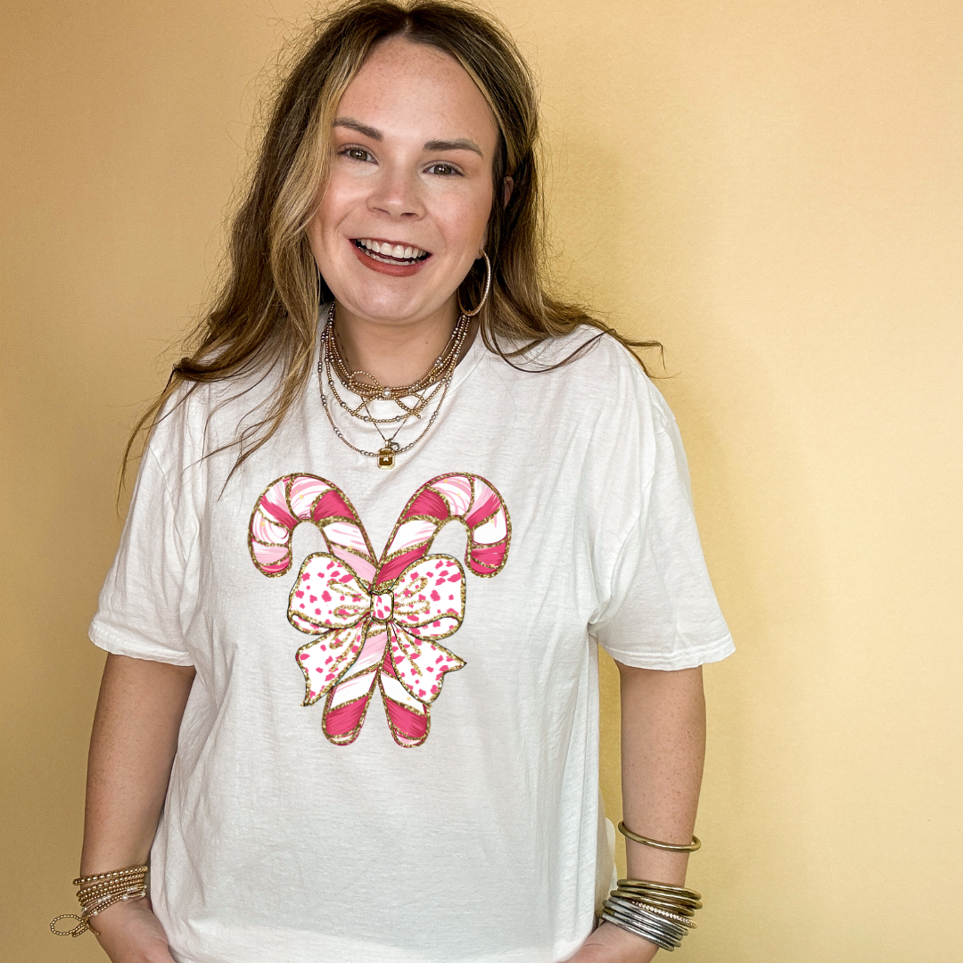 Online Exclusive | Pink Swirl Candy Cane Tied with Bow Graphic Tee in Multiple Color Options