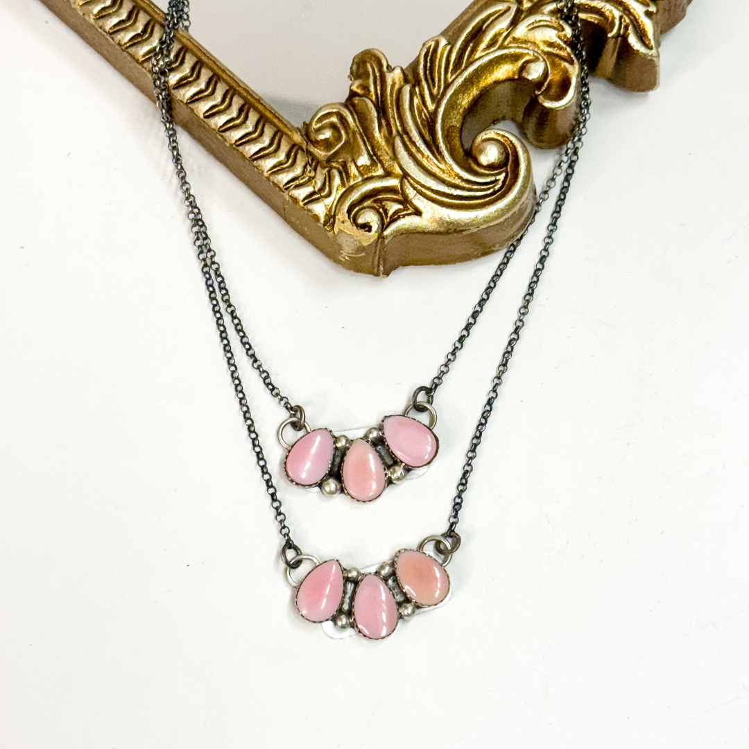 Navajo handmade sterling silver pink conch necklace by Native American artist Jimson Belin, pink conch cluster pendant necklace