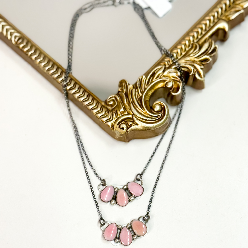 Navajo handmade sterling silver pink conch necklace by Native American artist Jimson Belin, pink conch cluster pendant necklace