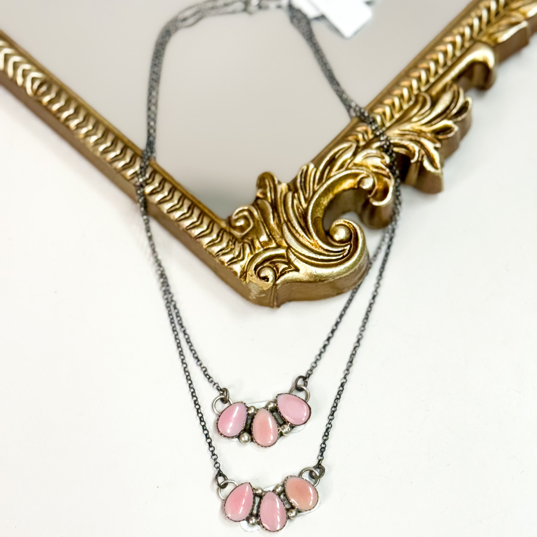 Navajo handmade sterling silver pink conch necklace by Native American artist Jimson Belin, pink conch cluster pendant necklace