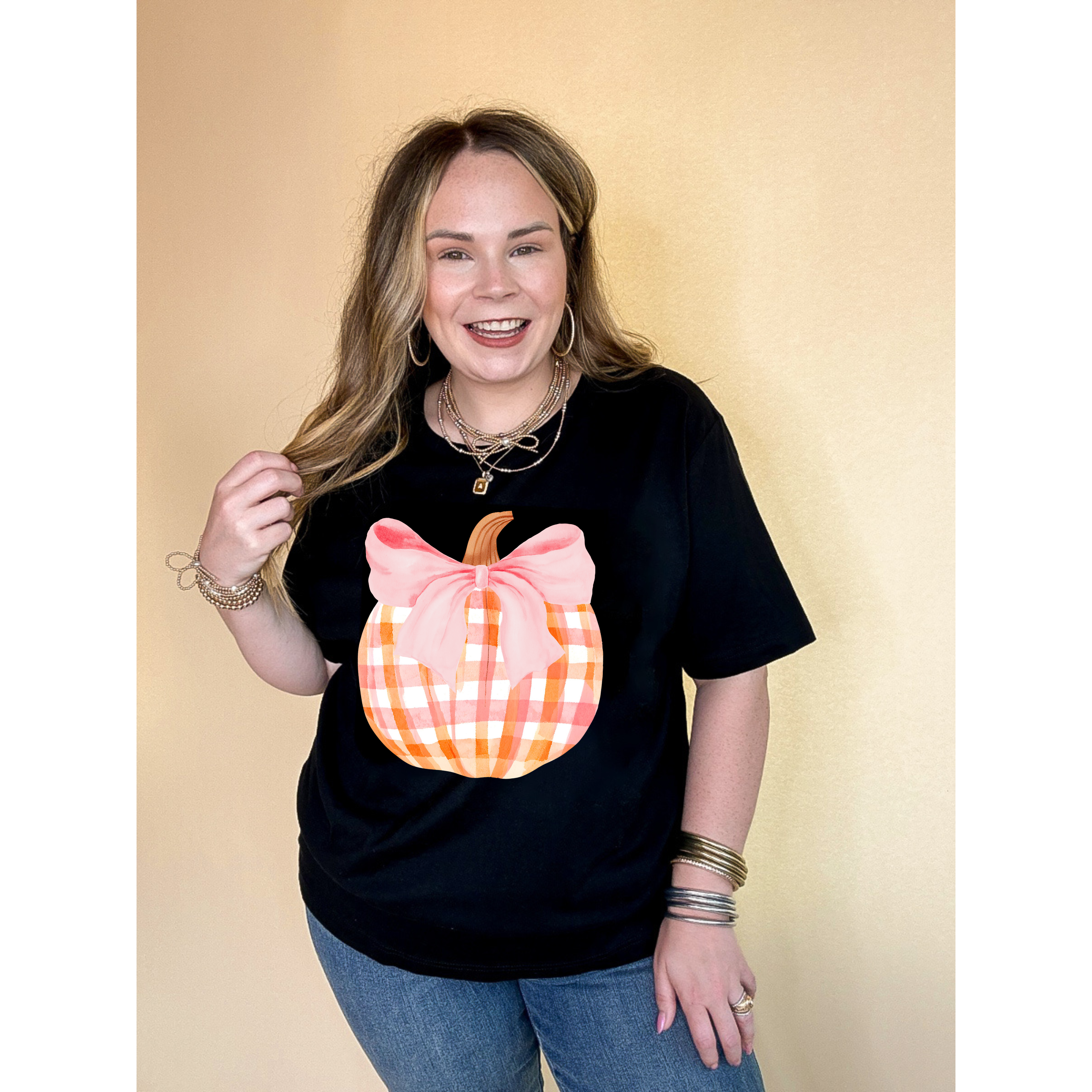 Online Exclusive | Charming Orange and White Plaid Pumpkin with Pink Bow Graphic Tee in Multiple Color Options