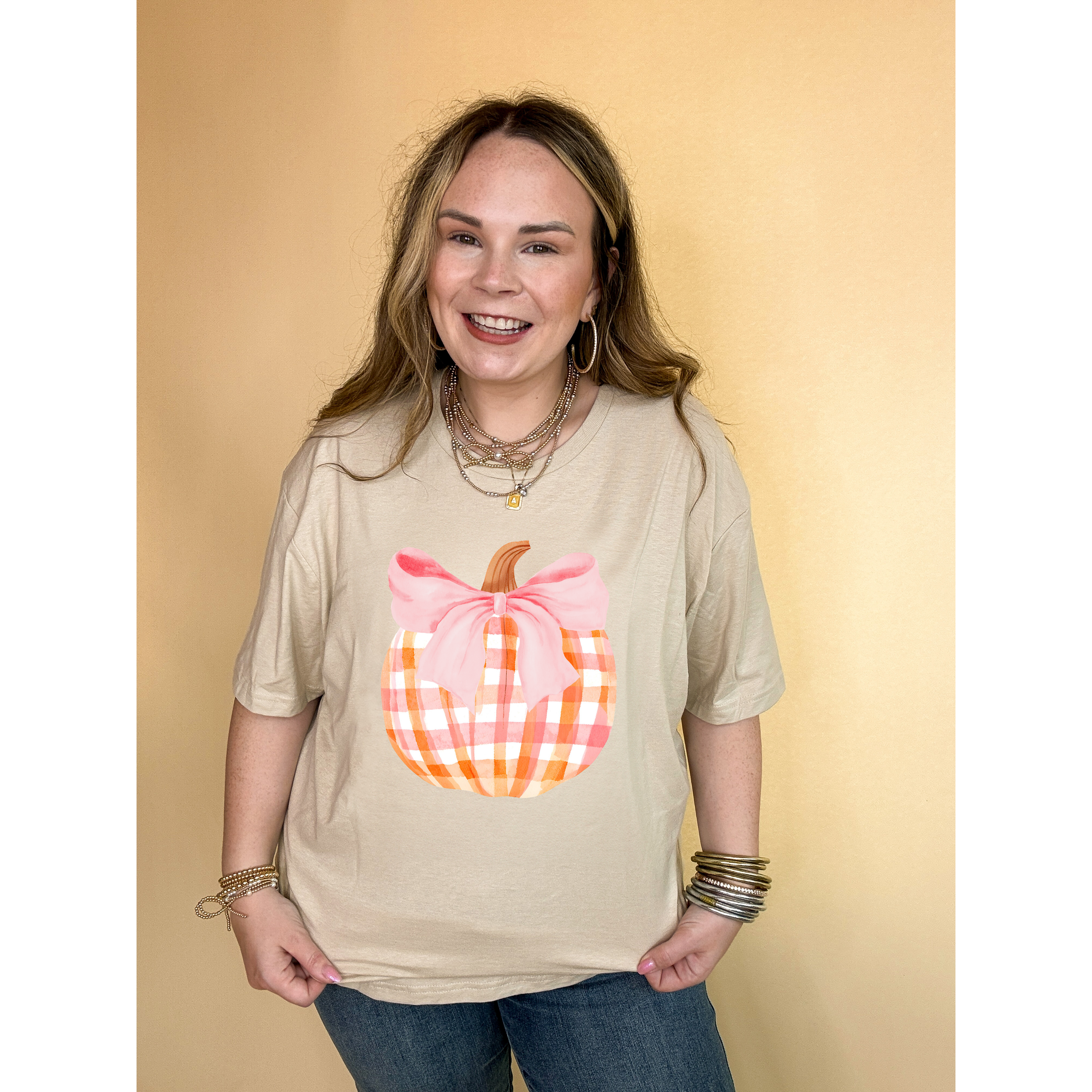 Online Exclusive | Charming Orange and White Plaid Pumpkin with Pink Bow Graphic Tee in Multiple Color Options