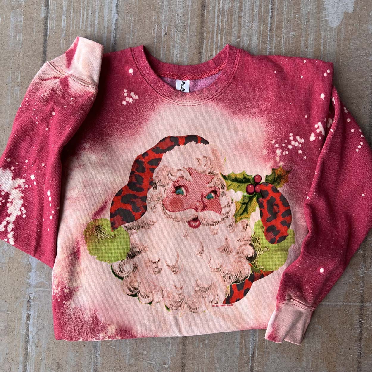 Online Exclusive | Red Leopard Santa Long Sleeve Bleached Splatter Graphic Sweatshirt in Red - Giddy Up Glamour Boutique