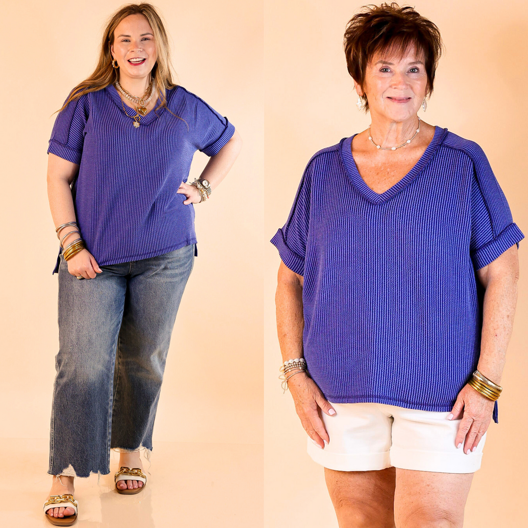 Designed with a flattering V-neck, ribbed texture, short sleeves, and a slight high-low hemline. Sizes are S/M and L/XL.