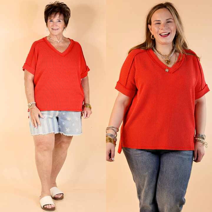 Designed with a flattering V-neck, ribbed texture, short sleeves, and a slight high-low hemline. 