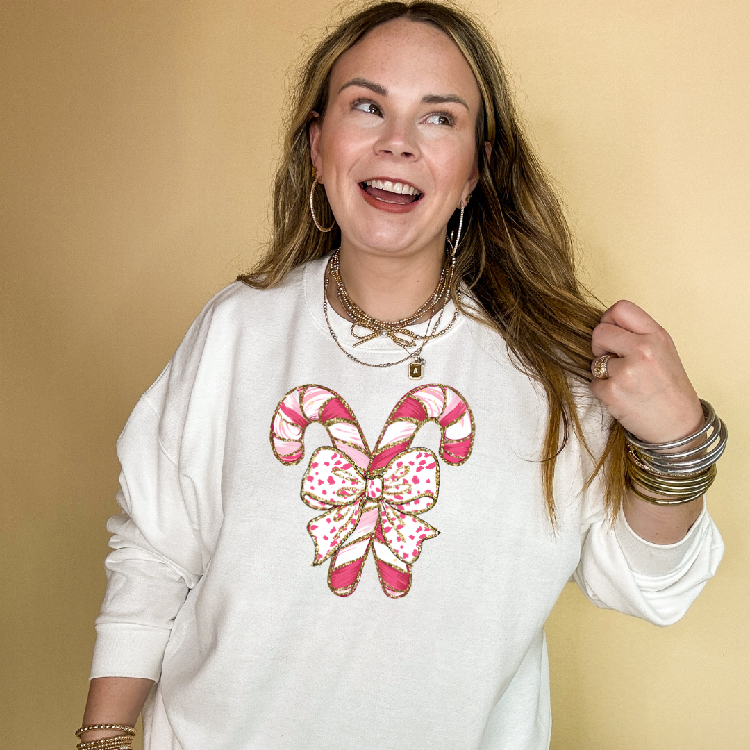 Online Exclusive | Pink Swirl Candy Cane Tied with Bow Graphic Sweatshirt in Multiple Color Options