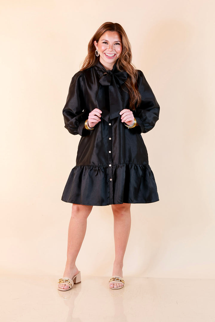 Sealed With a Bow Tie Neck Long Sleeve Button Front Dress with Ruffle Hem in Black