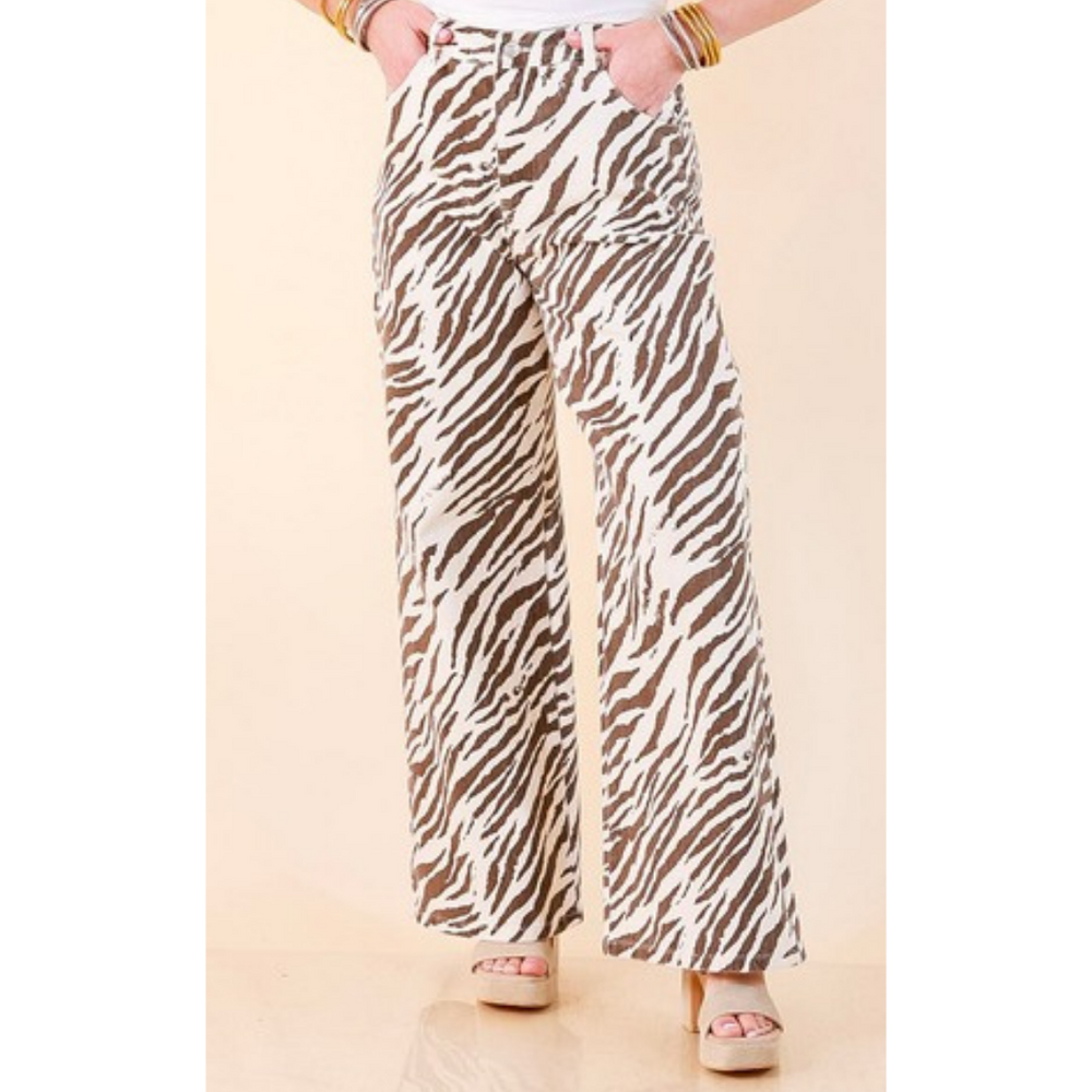 Full length image of a woman wearing the Second Nature Zebra Print Wide Leg Pants in Ecru and Brown