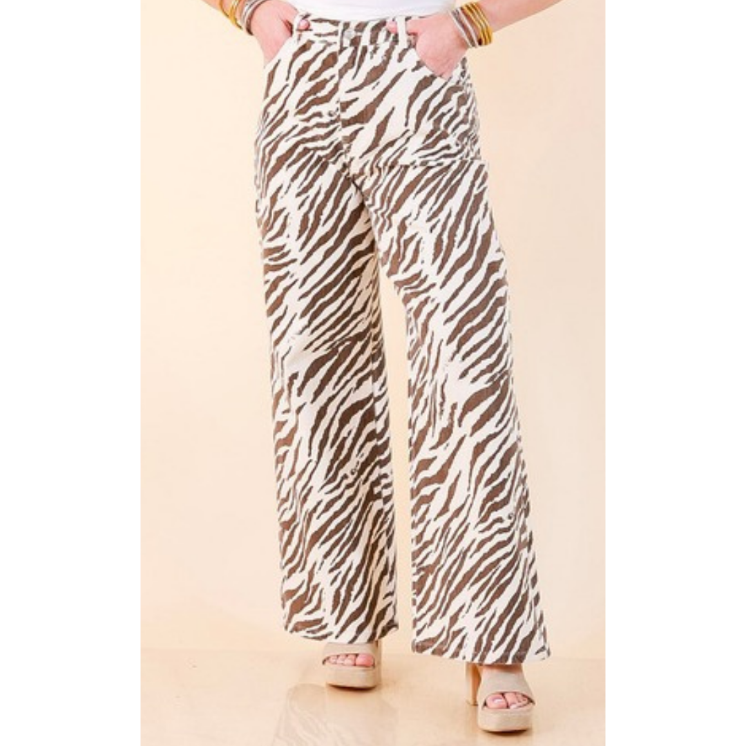 Full length image of a woman wearing the Second Nature Zebra Print Wide Leg Pants in Ecru and Brown