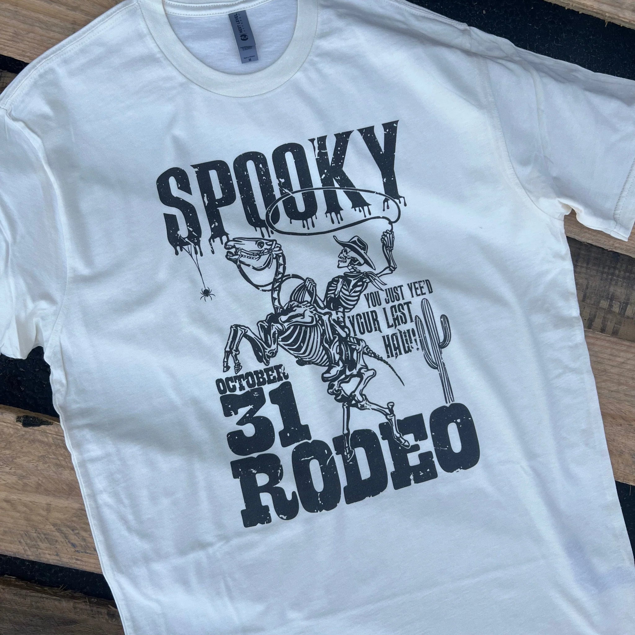 Online Exclusive | Spooky October Rodeo Short Sleeve Graphic Tee in White - Giddy Up Glamour Boutique