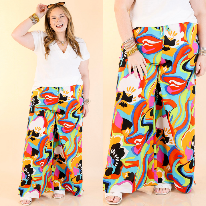 A stretchy waistband and the fun blue, orange, purple, black, white, red, and green abstract pattern. Sizes small to large.