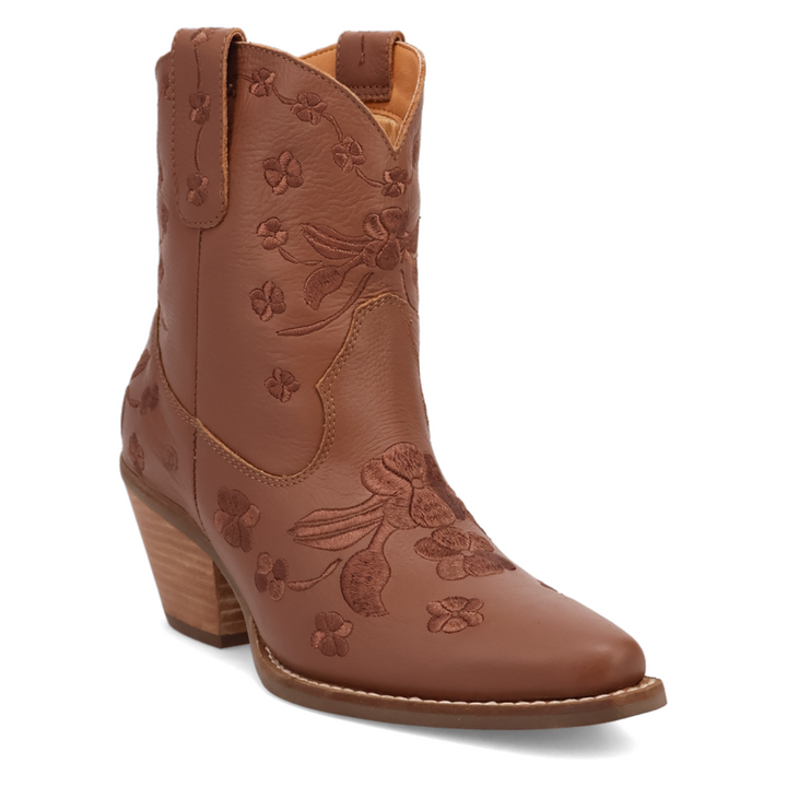 Short brown leather western boot with a rounded pointed toe, soft floral embroidery throughout the shaft and foot, stitching, side pull tabs, and a medium 2 inch stacked wooden heel. Feminine and flirty with a vintage cowgirl twist.