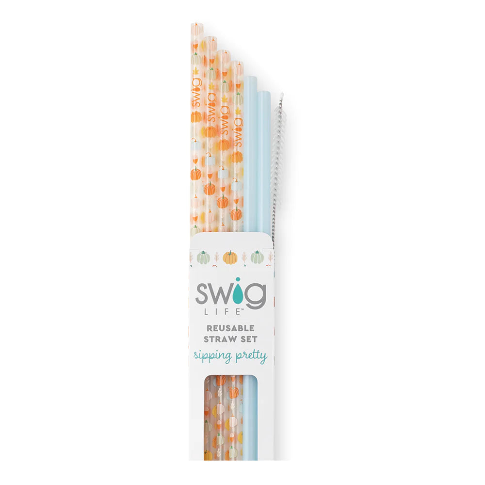 Swig | Pumpkin Spice + Light Blue Reusable Straw Set. 4 pumpkin spice straws and 2 light blue straws. The pack also comes with a straw cleaner. The background of the straws are white.