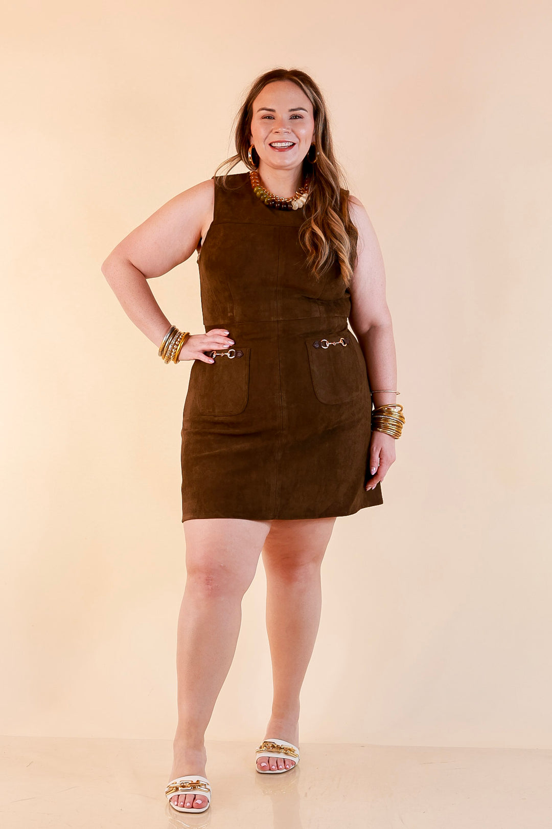 The Fine Print Sleeveless Faux Suede Tank Mini Dress with Horsebit Detailing in Olive Brown