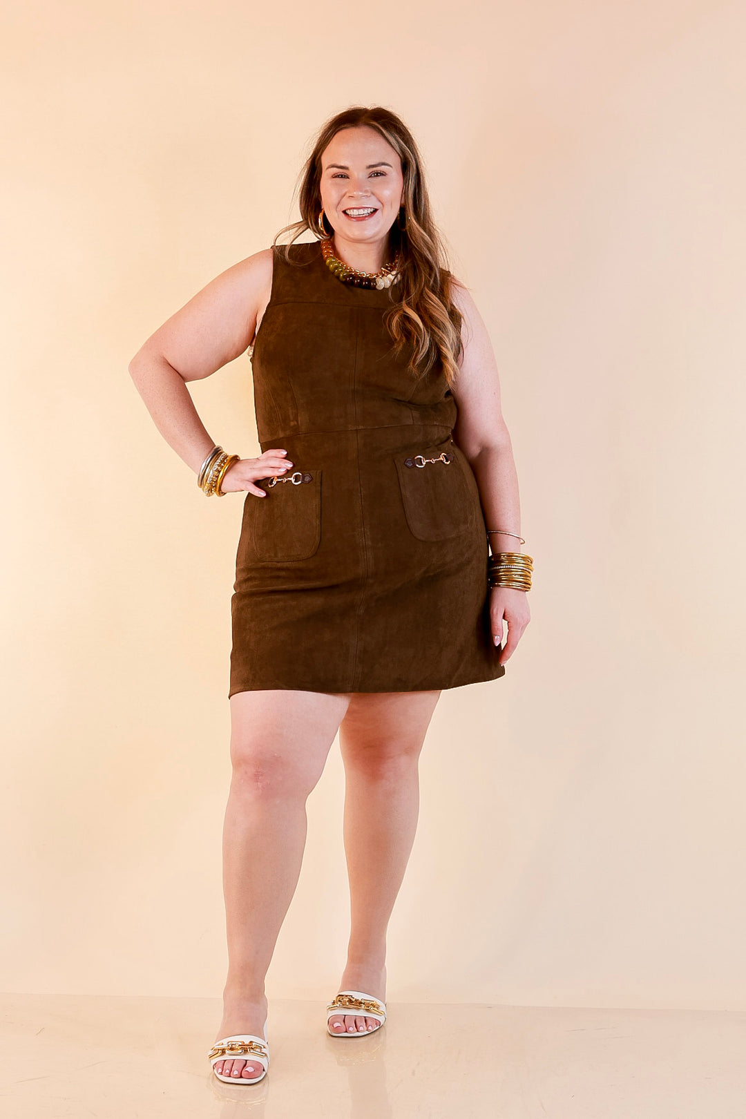 The Fine Print Sleeveless Faux Suede Tank Mini Dress with Horsebit Detailing in Olive Brown
