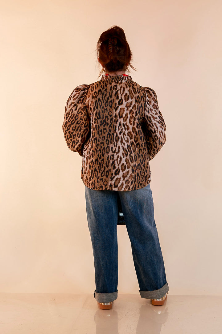 The Golden Hour Leopard Print Jacquard Ruffle Split Neck Balloon Sleeve Top in Gold and Brown