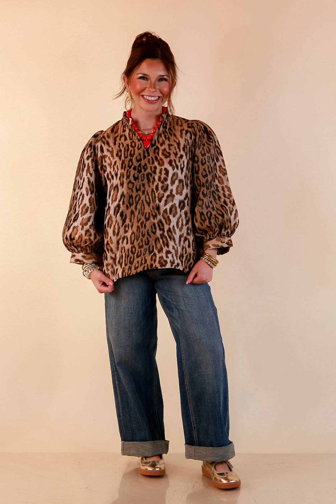 The Golden Hour Leopard Print Jacquard Ruffle Split Neck Balloon Sleeve Top in Gold and Brown