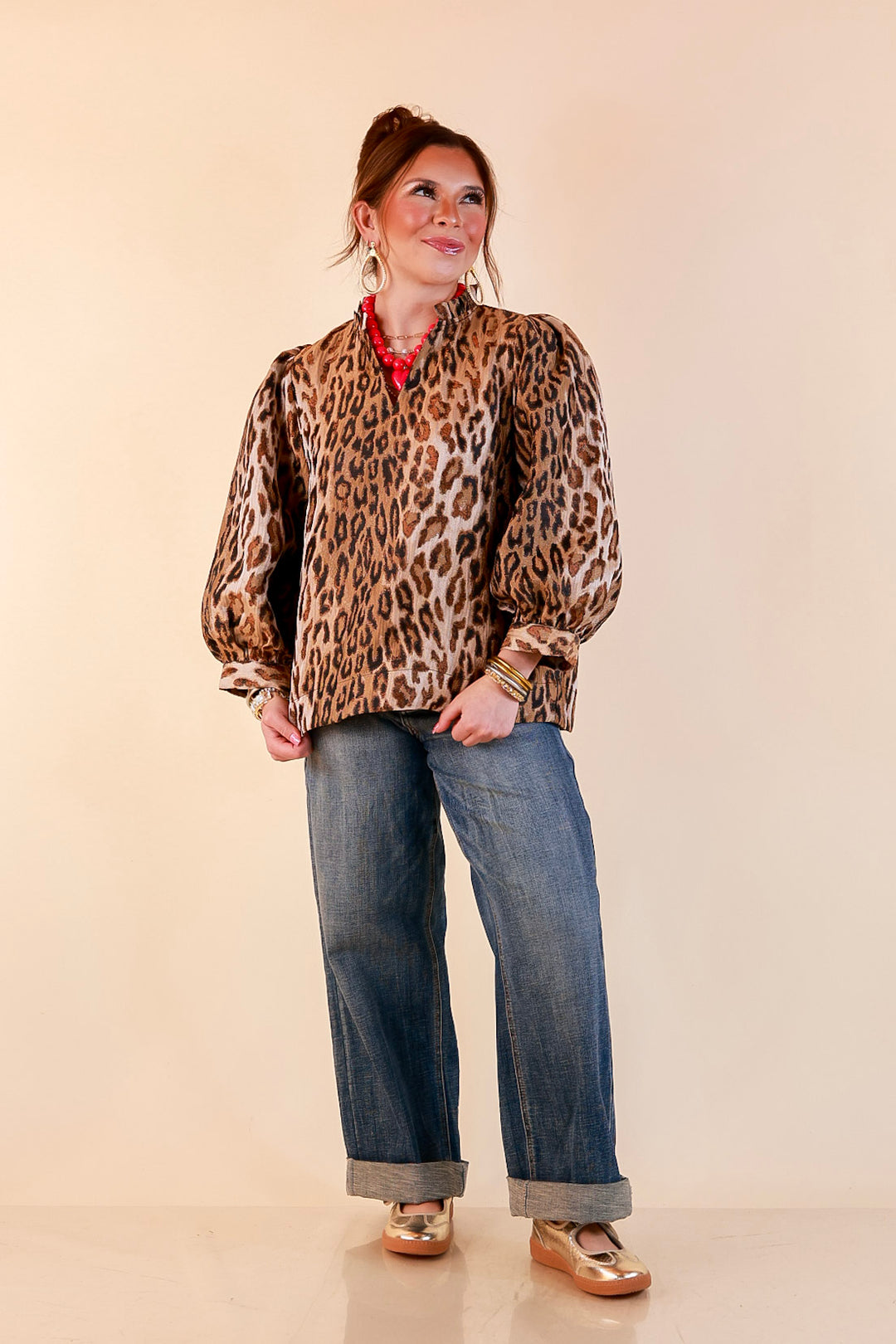 The Golden Hour Leopard Print Jacquard Ruffle Split Neck Balloon Sleeve Top in Gold and Brown