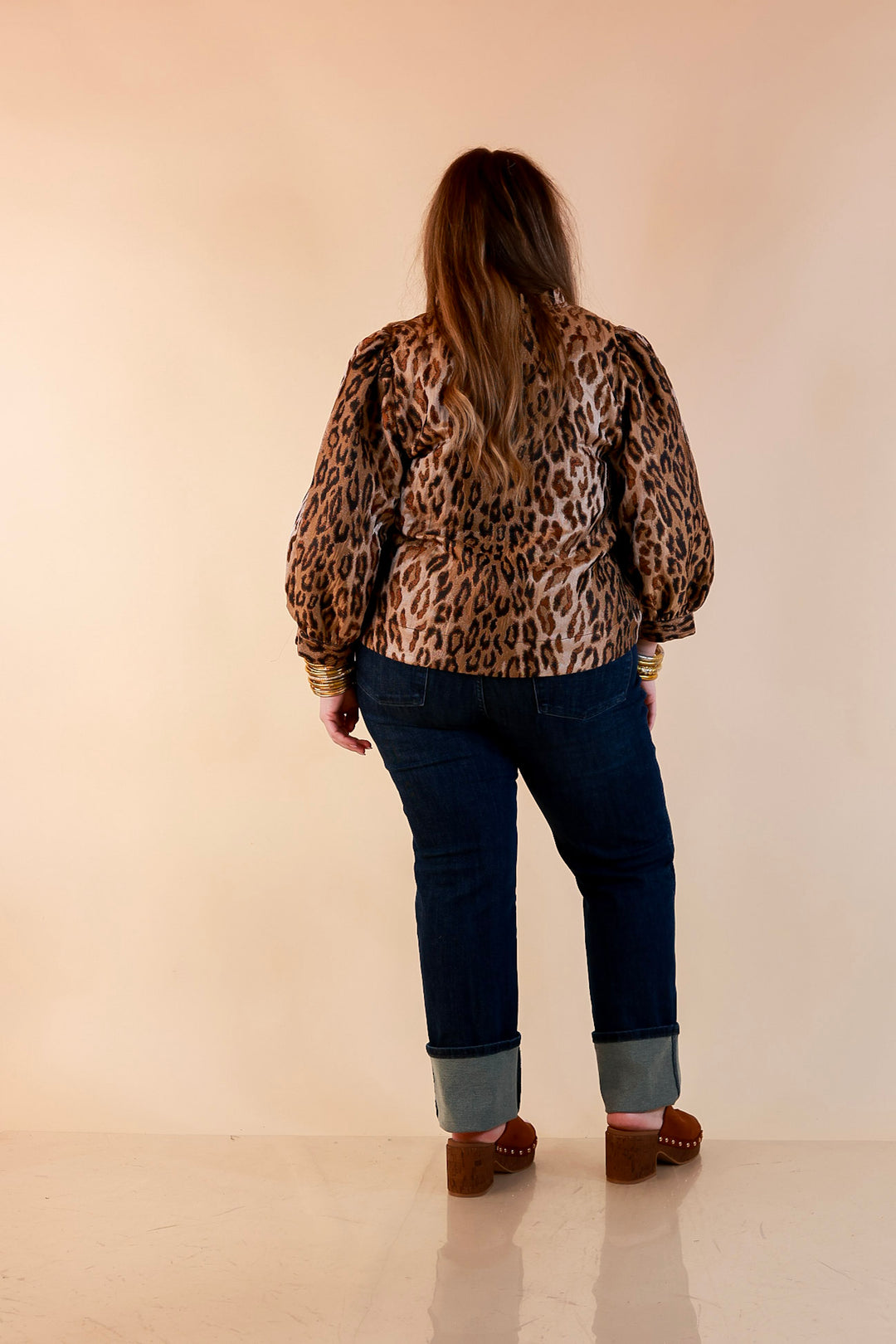 The Golden Hour Leopard Print Jacquard Ruffle Split Neck Balloon Sleeve Top in Gold and Brown