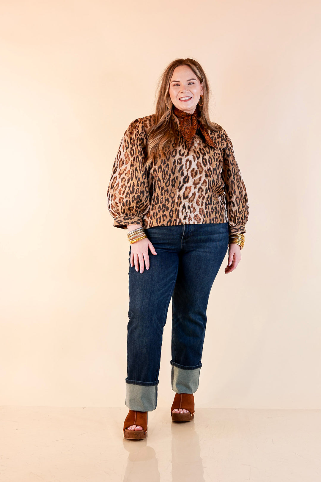 The Golden Hour Leopard Print Jacquard Ruffle Split Neck Balloon Sleeve Top in Gold and Brown