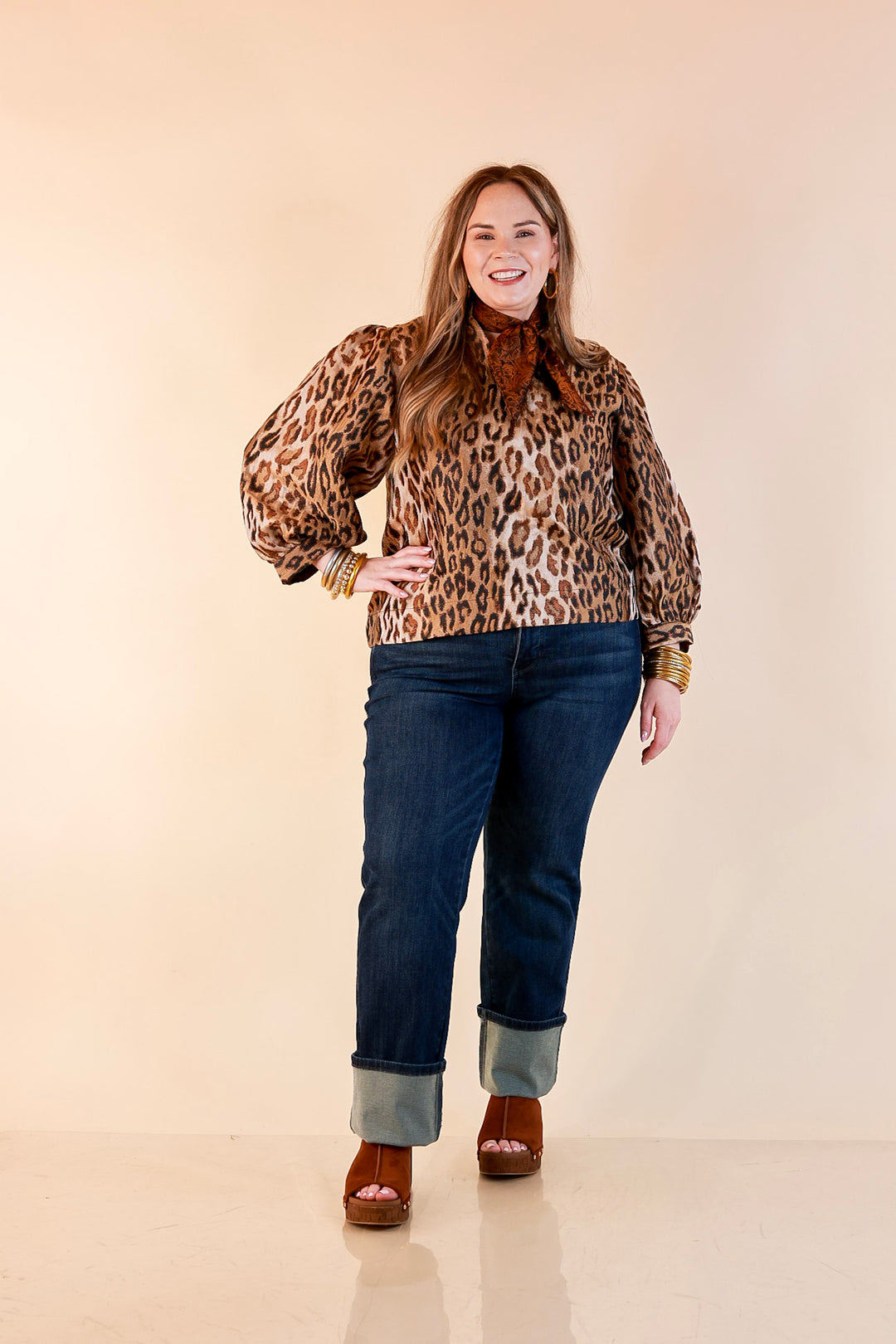 The Golden Hour Leopard Print Jacquard Ruffle Split Neck Balloon Sleeve Top in Gold and Brown