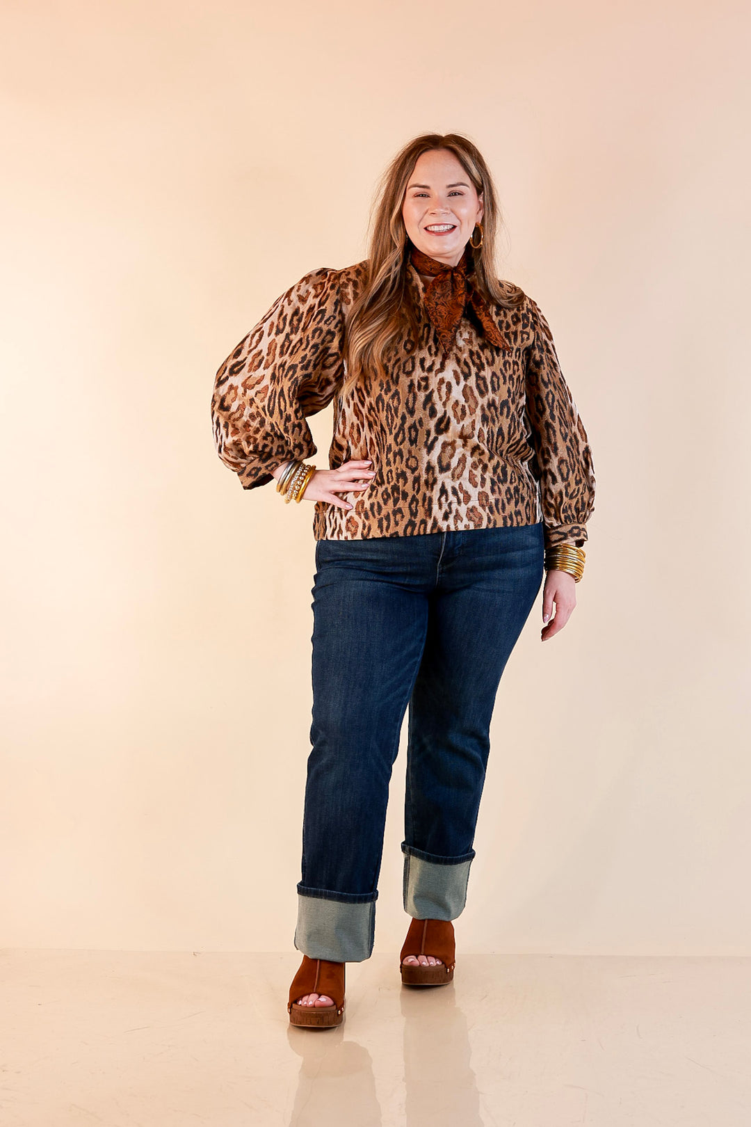 The Golden Hour Leopard Print Jacquard Ruffle Split Neck Balloon Sleeve Top in Gold and Brown