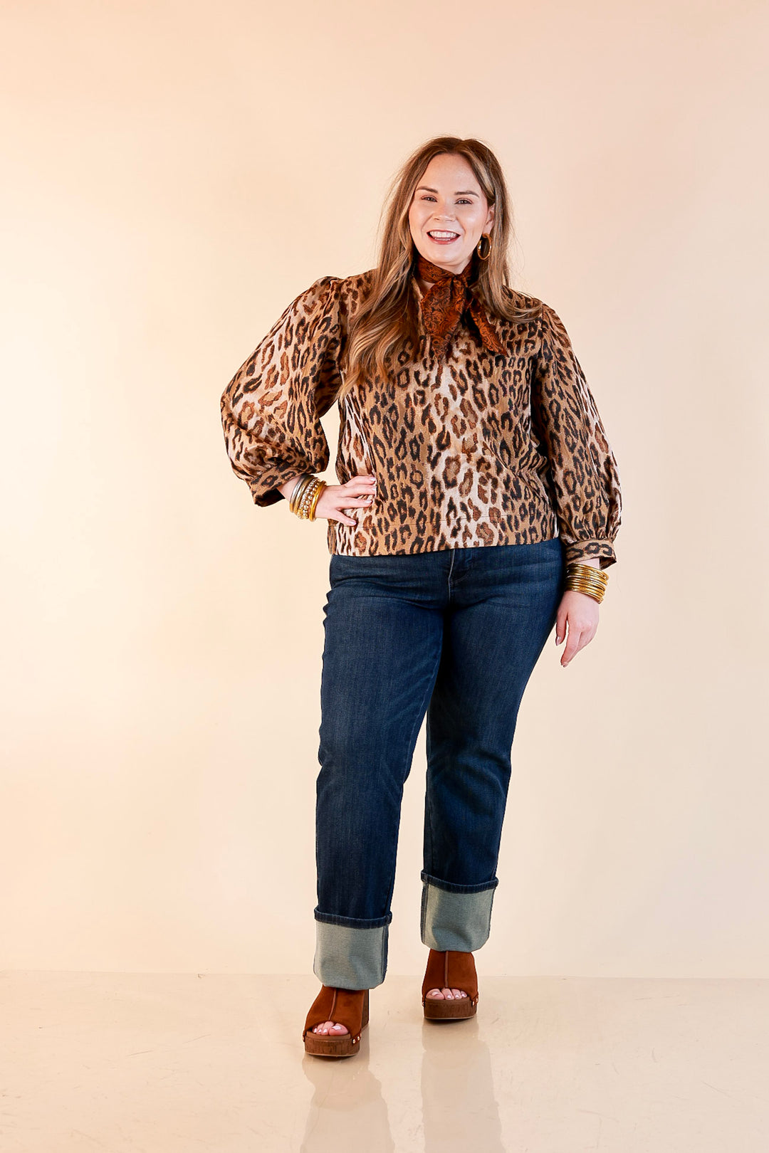 The Golden Hour Leopard Print Jacquard Ruffle Split Neck Balloon Sleeve Top in Gold and Brown