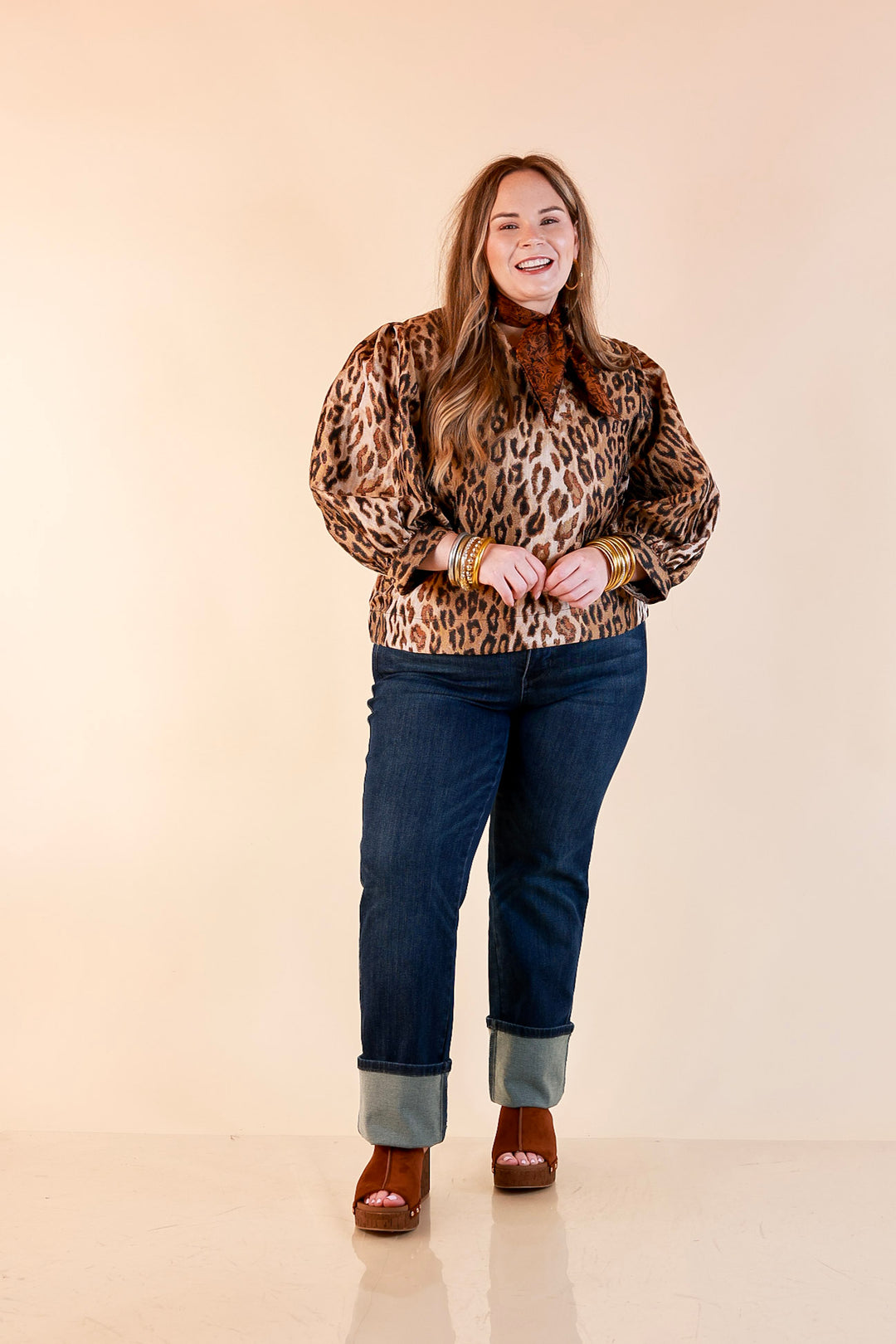The Golden Hour Leopard Print Jacquard Ruffle Split Neck Balloon Sleeve Top in Gold and Brown