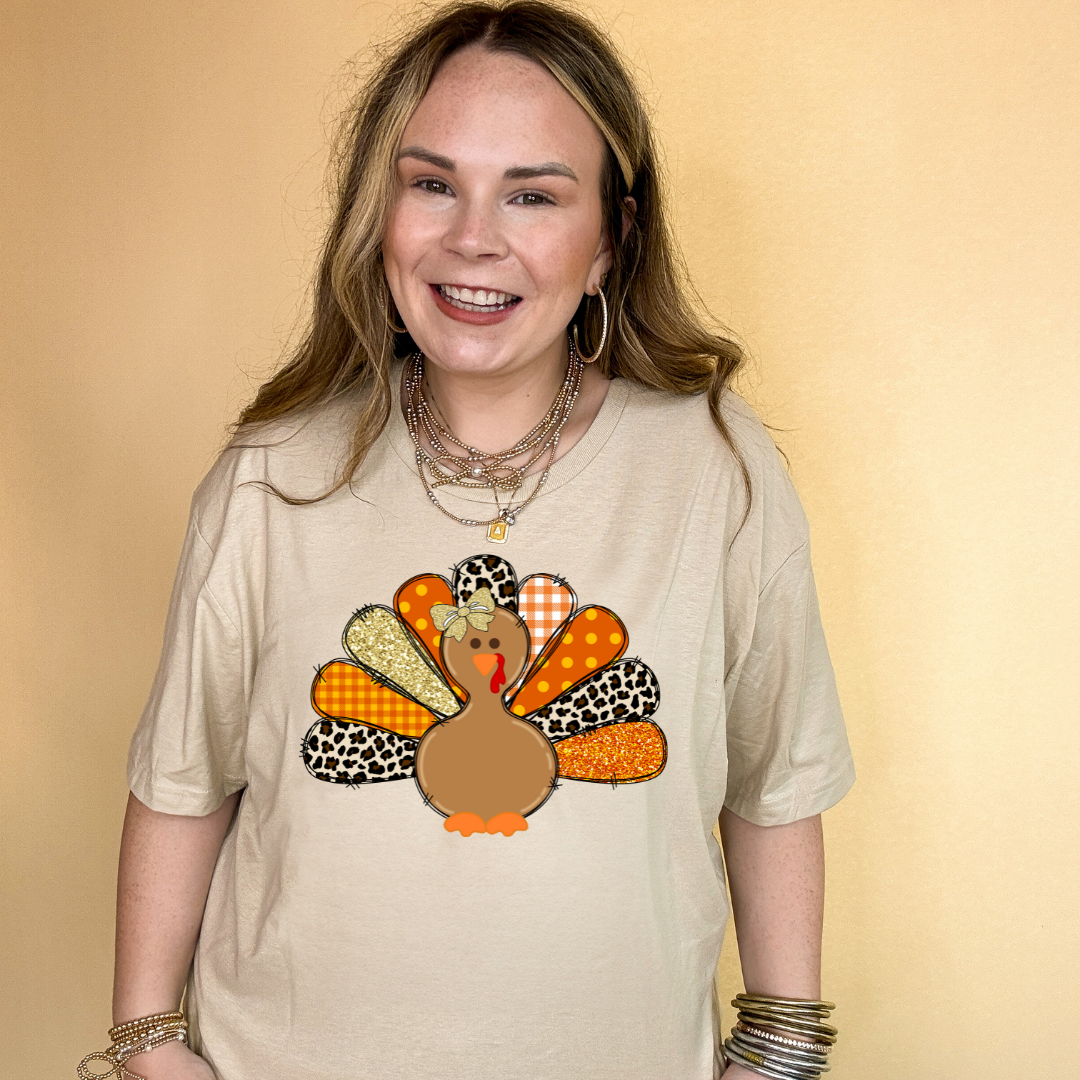 Online Exclusive | Patched Turkey with Bow Graphic Tee in Multiple Color Options