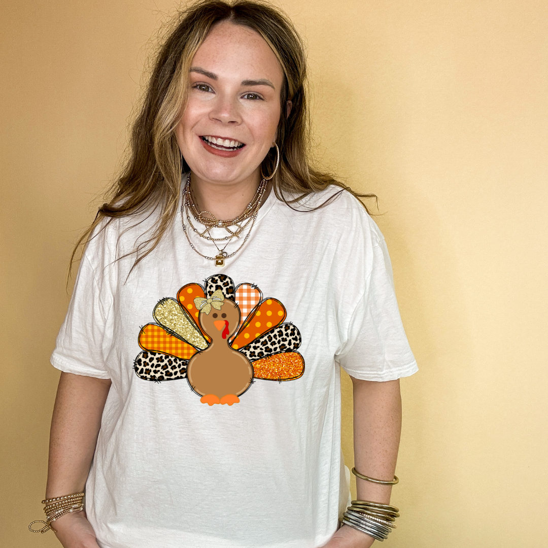 Online Exclusive | Patched Turkey with Bow Graphic Tee in Multiple Color Options