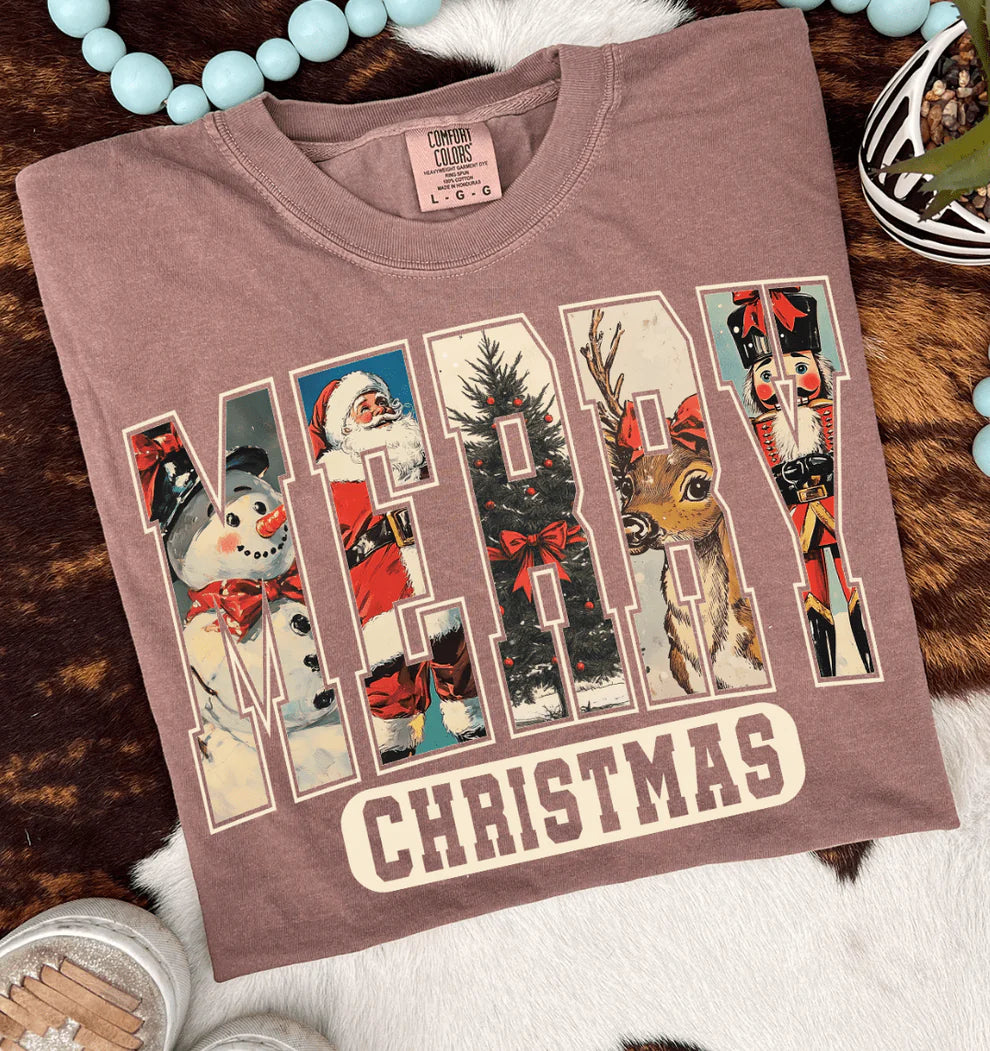 Brown t-shirt with Christmas-themed design on a wooden surface