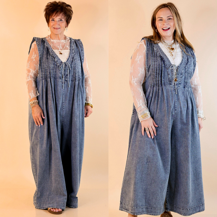 Featuring a dramatic extra wide-leg design, a deep V-neck, and functional pockets for added convenience, this jumpsuit blends fashion and function. In sizes small to 3XL.
