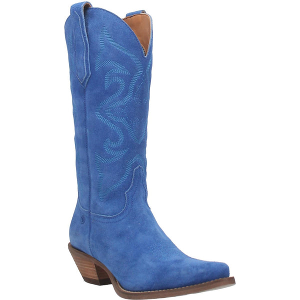A blue mid calf length suede boot with a unique stitched pattern on the front, matching suede straps, a V cut on the top, and a small heel. Item is pictured on a plain white background