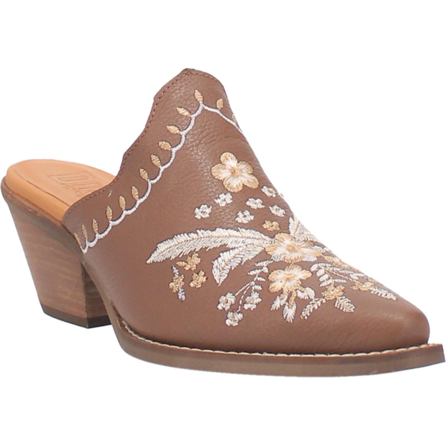 A brown bootie with a white and cream floral and feather design on the upper, a white and cream stitched design on the edge, and a short heel