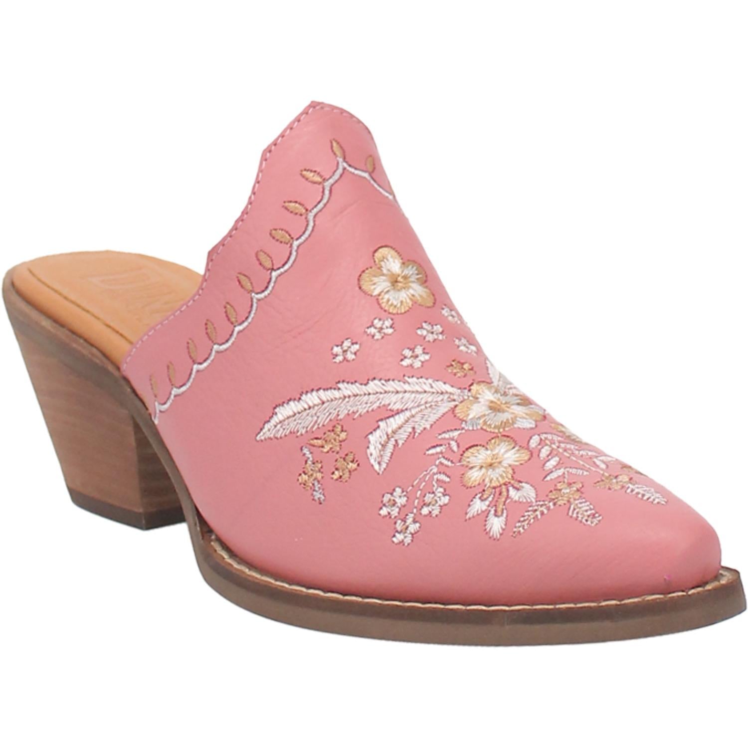 A pink bootie with a white and cream floral and feather design on the upper, a white and cream stitched design on the edge, and a short heel.