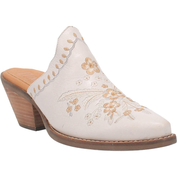 A white bootie with a cream colored floral and feather design on the upper, a white and cream stitched design on the edge, and a short heel.