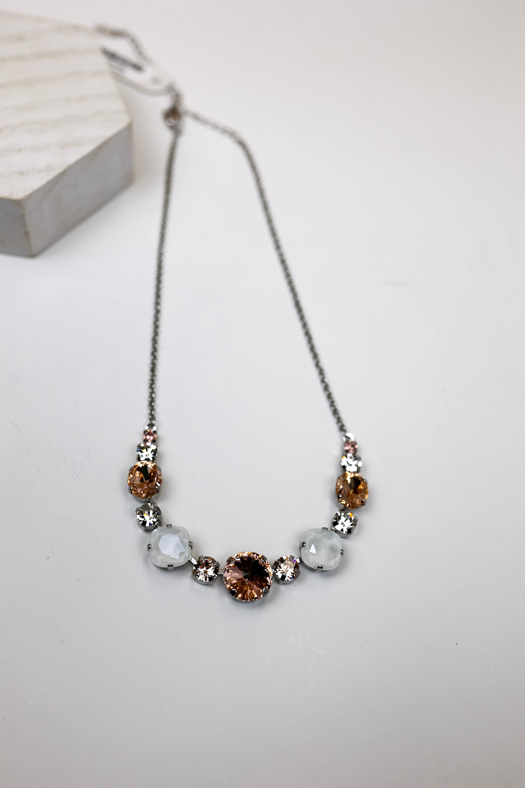 Sorrelli | Half Circle Tennis Necklace in Palladium Silver Tone and Snow Bunny - Giddy Up Glamour Boutique