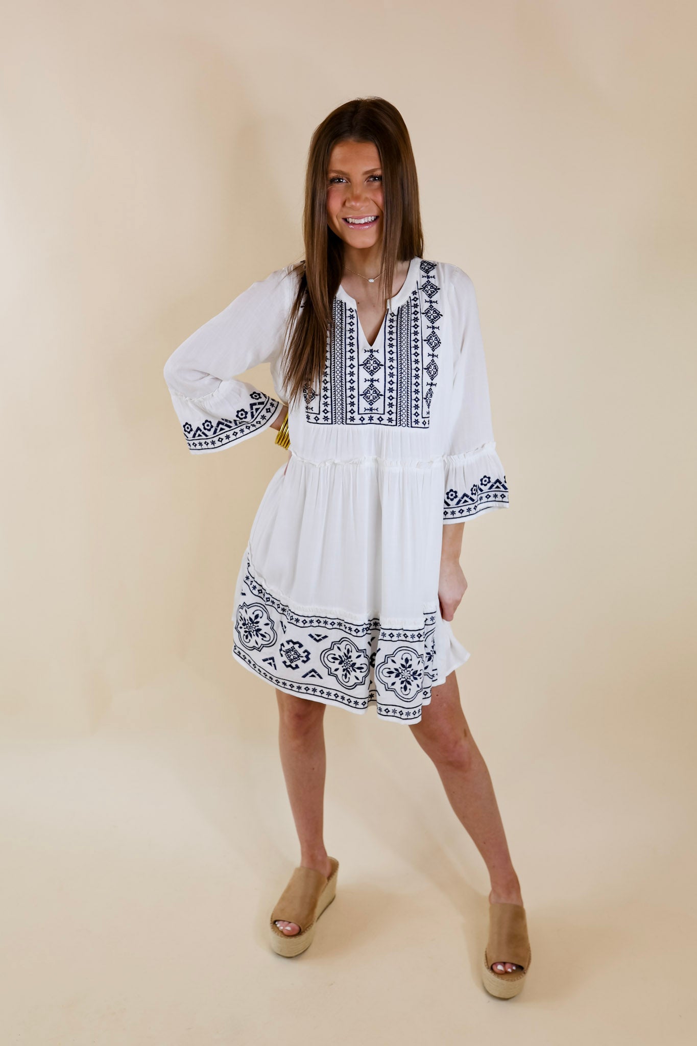 Peaceful And Pretty Navy Embroidered Dress with Notched Neckline in White