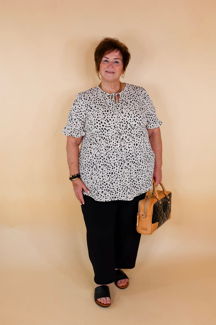 Waiting For A Sign Cheetah Print Babydoll Top with Keyhole and Tie Neckline in Ivory - Giddy Up Glamour Boutique