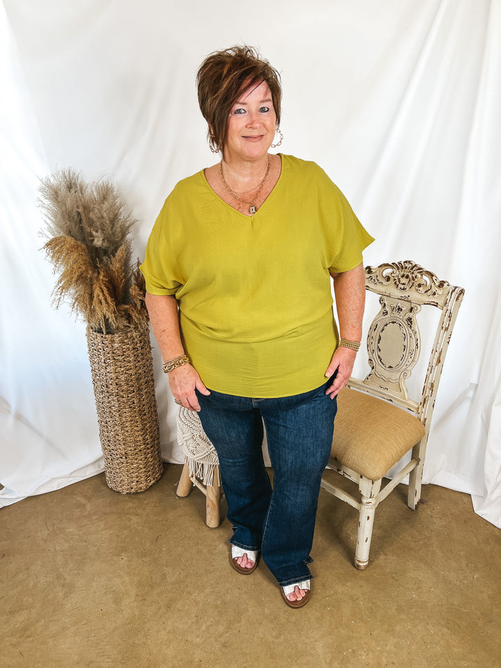 Lovely Dear V Neck Short Sleeve Solid Top in Gold Kiwi - Giddy Up Glamour Boutique