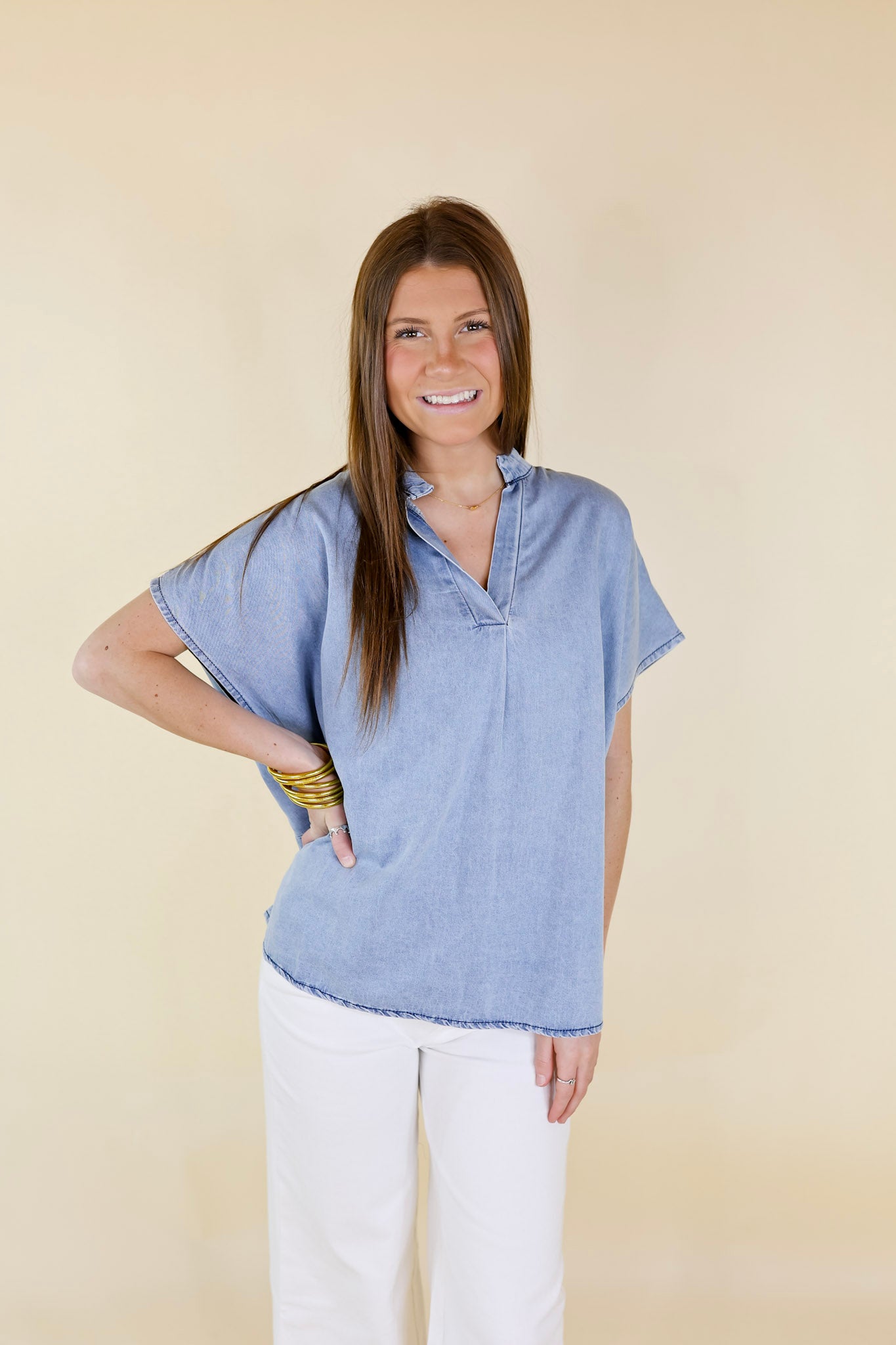Fact Or Fiction Denim Top with Notched Neckline in Light Wash - Giddy Up Glamour Boutique