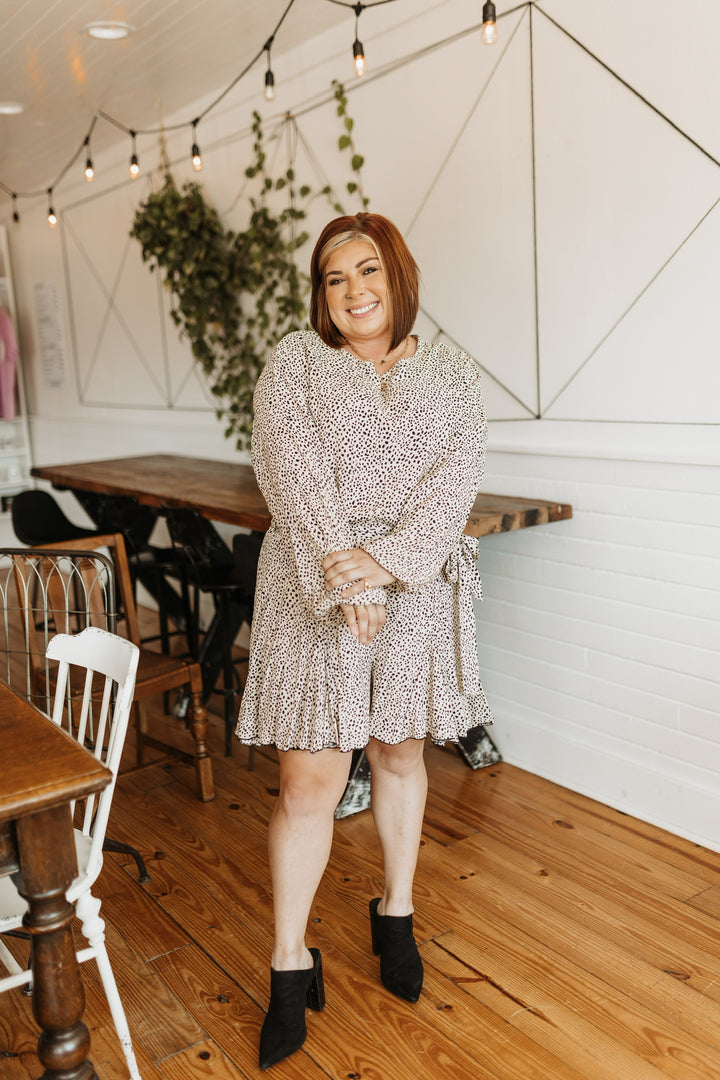 Swift Moves Dotted Long Sleeve Romper with Waist Tie in Beige - Giddy Up Glamour Boutique