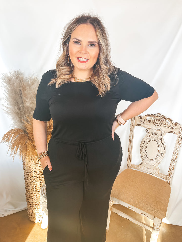 Keep My Love Short Sleeve Jumpsuit Romper with Drawstring Waist in Black - Giddy Up Glamour Boutique