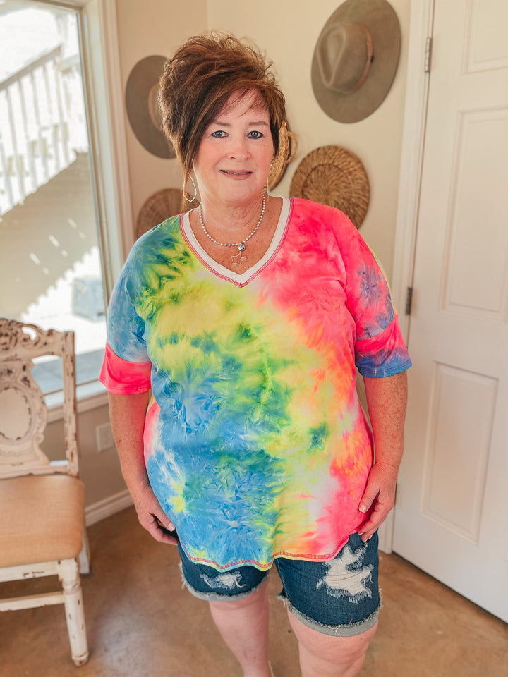 Last Chance Size Small & Med. | Bright Forecasts Tie Dye V Neck Top in Neon Pink, Yellow, and Blue - Giddy Up Glamour Boutique