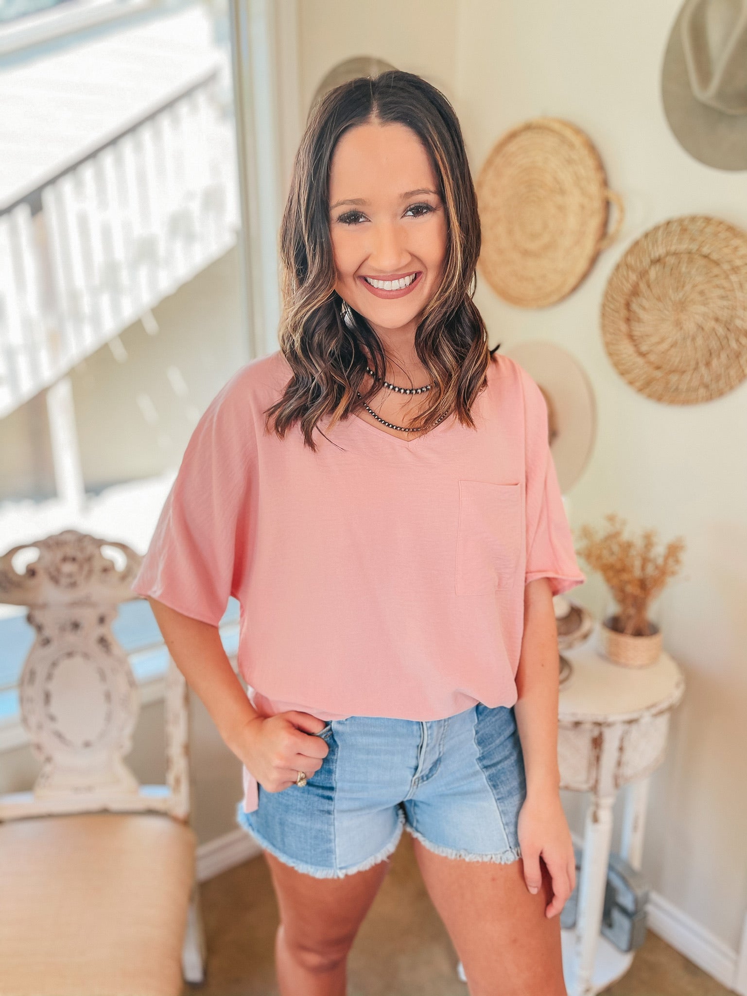 On Record V Neck Short Sleeve Shift Top with Front Pocket in Baby Pink - Giddy Up Glamour Boutique