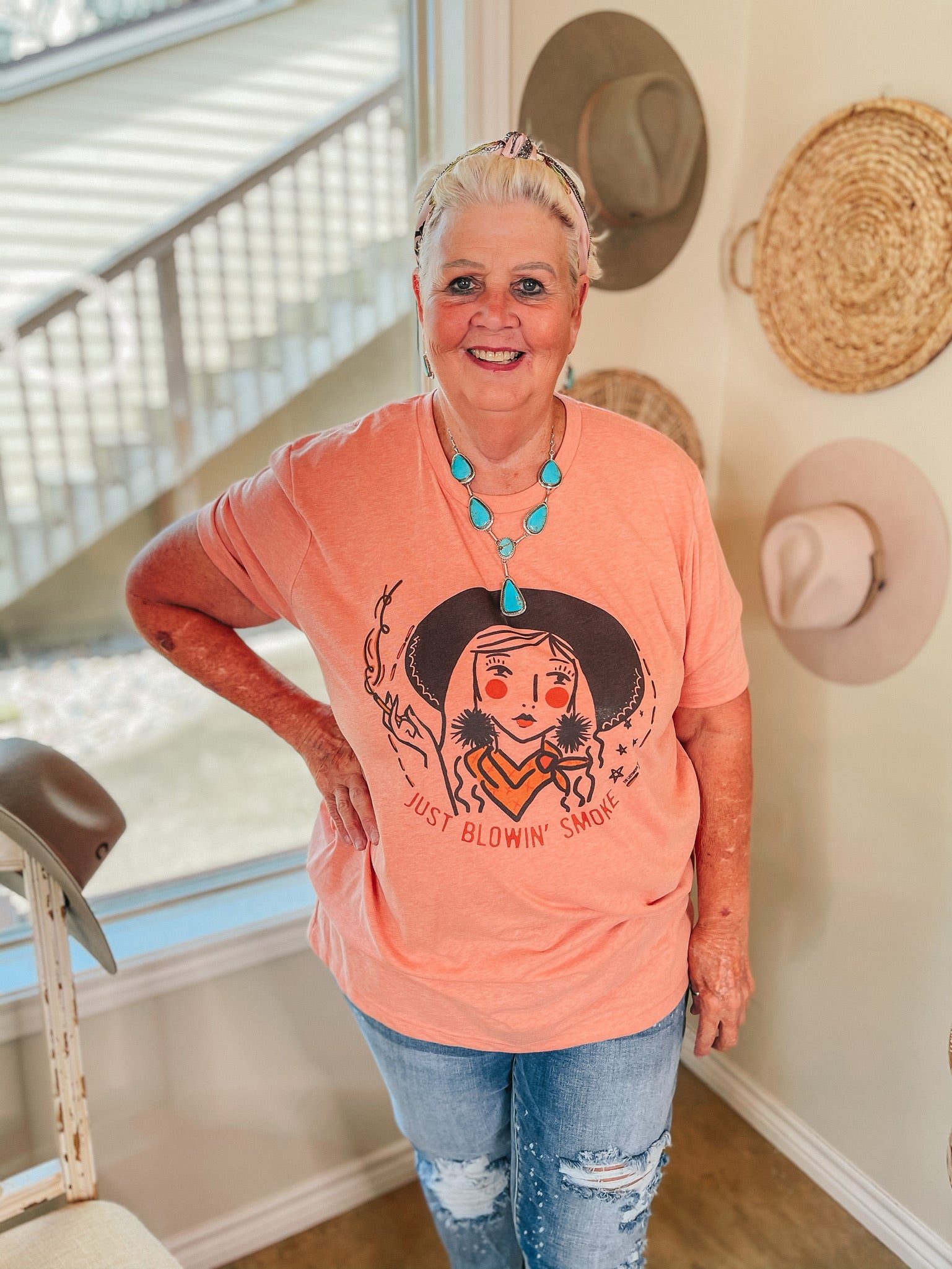 Just Blowin' Smoke Cowgirl Short Sleeve Graphic Tee in Peach - Giddy Up Glamour Boutique