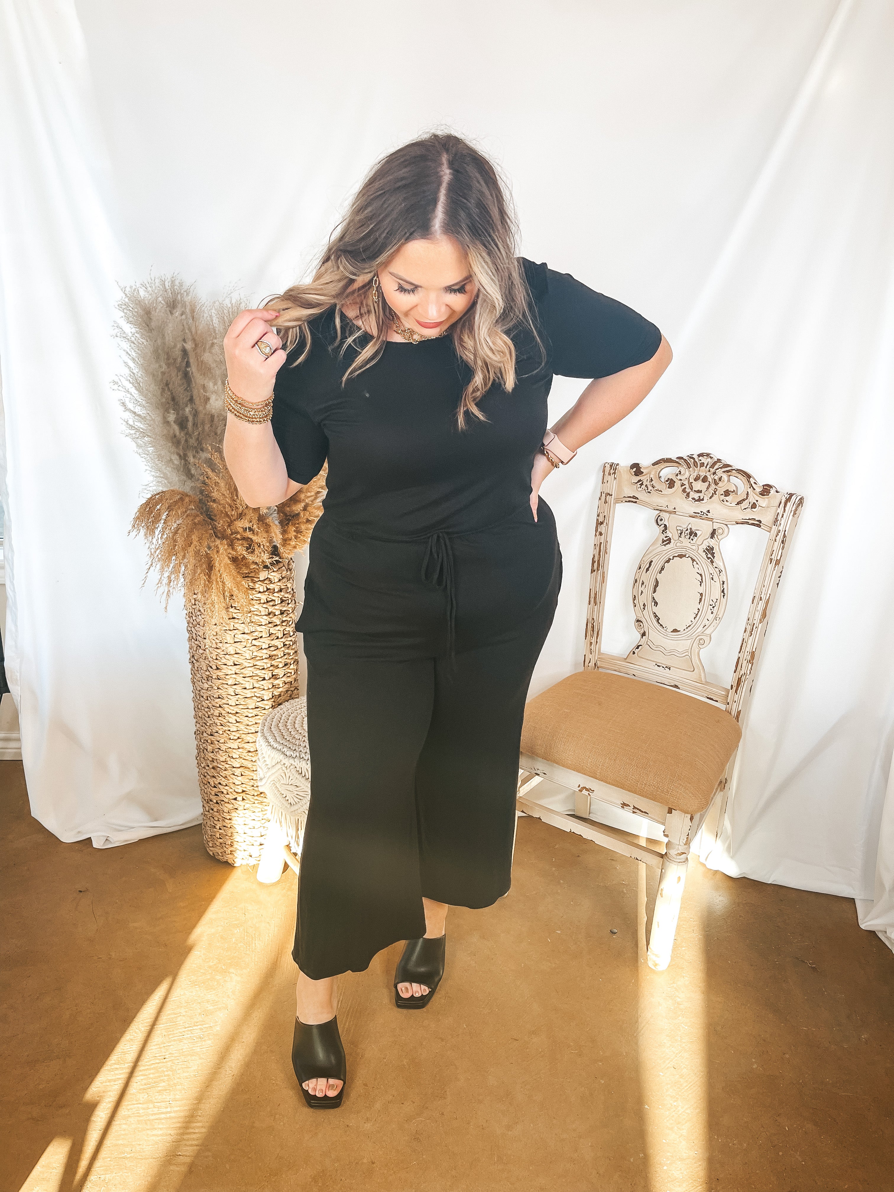 Keep My Love Short Sleeve Jumpsuit Romper with Drawstring Waist in Black - Giddy Up Glamour Boutique