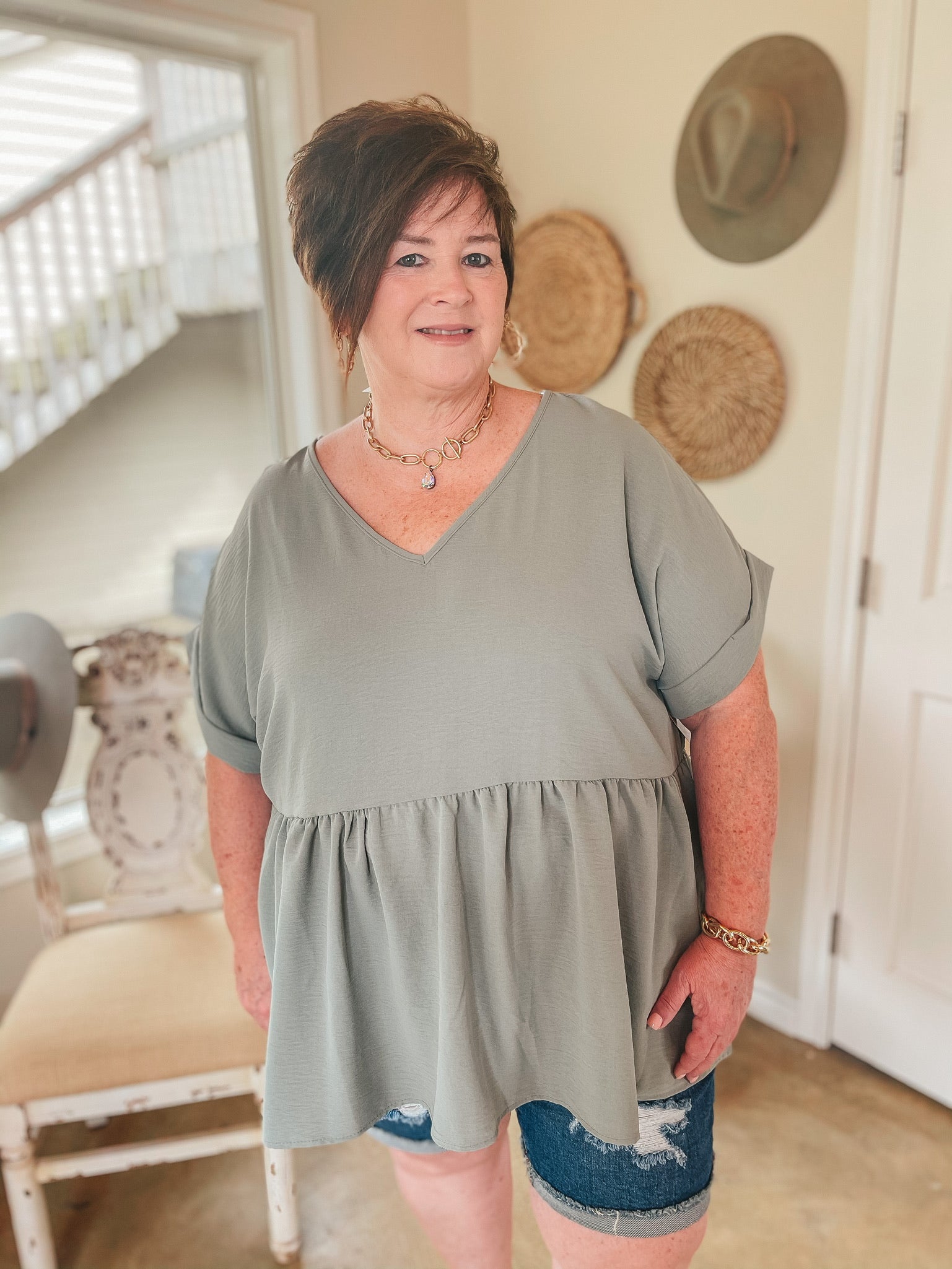 Touring the City Short Sleeve V Neck Babydoll Top in Sage Green - Giddy Up Glamour Boutique