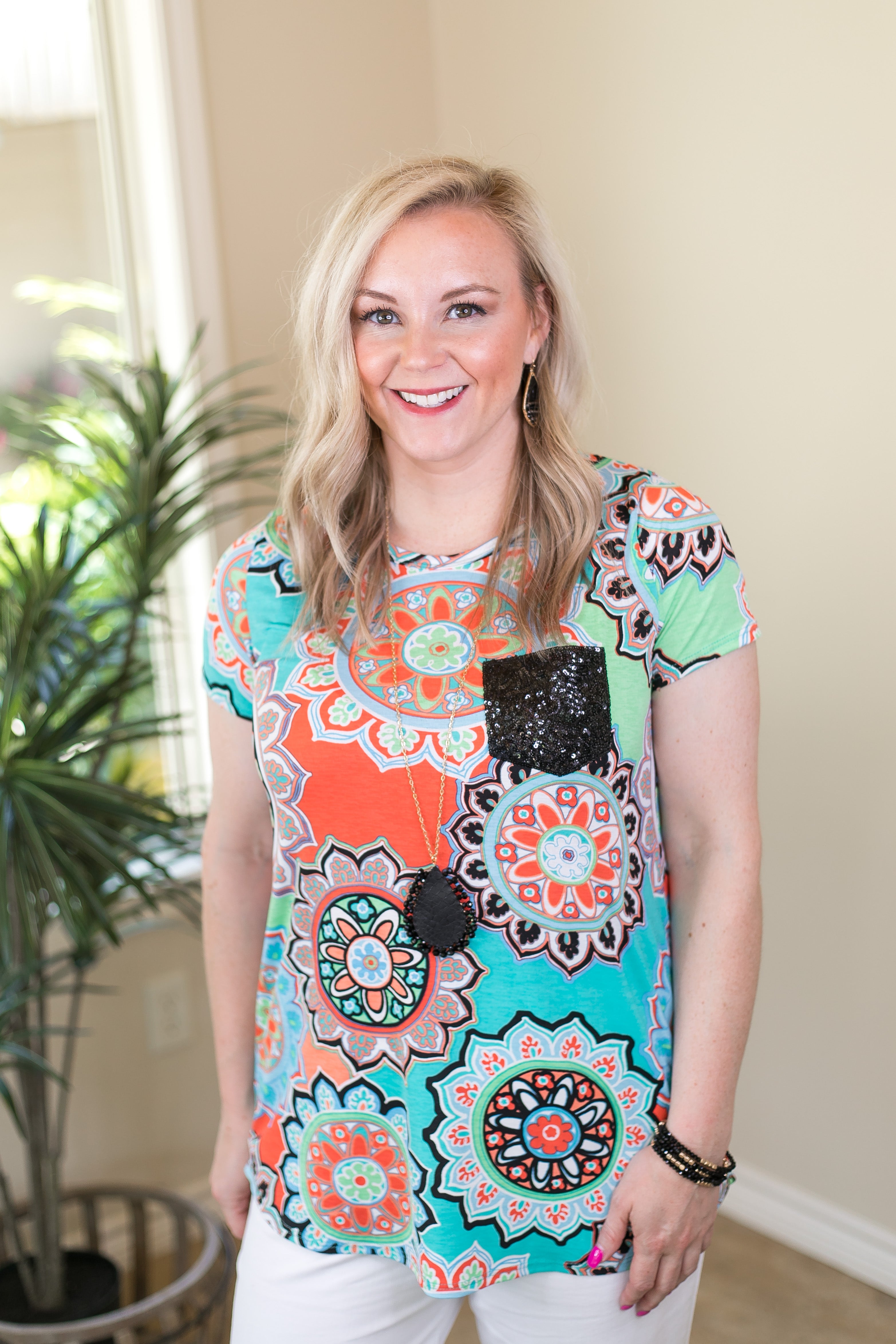Last Chance Size Small | Take A Glisten Geometric Floral Print Top with Sequin Pocket in Turquoise